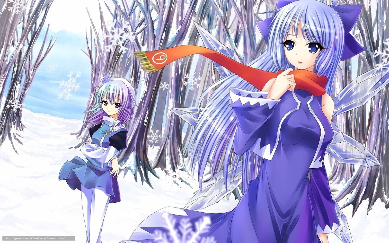 Two girls in a snowy forest
