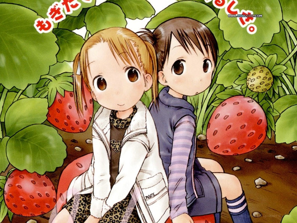 Two girls in a strawberry field