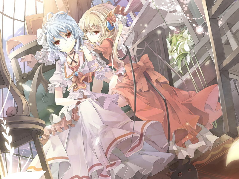 Two girls in a sunlit greenhouse