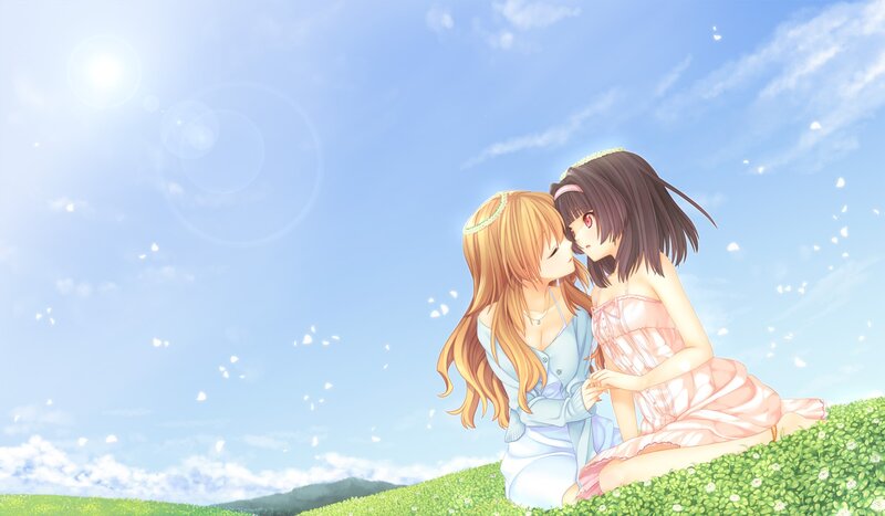 Two girls in a sunny field