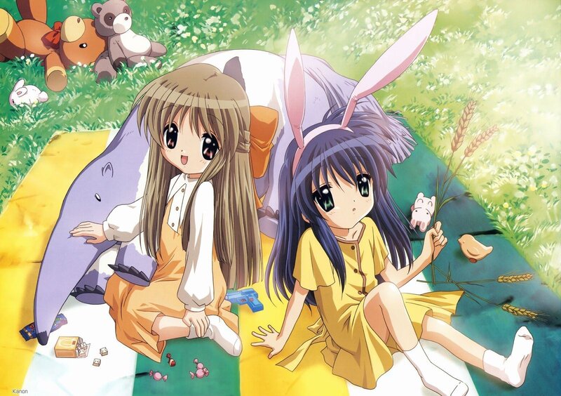 Two girls in a sunny field