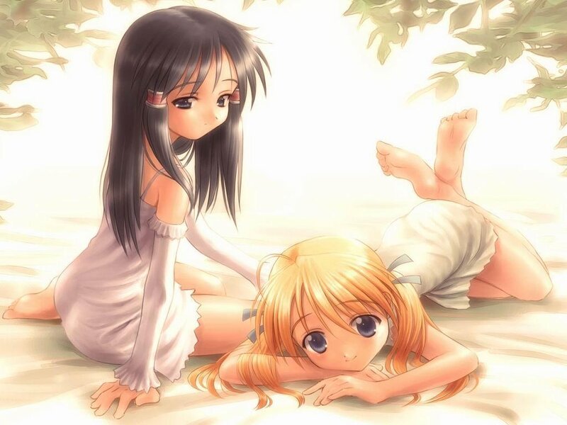 Two girls in a sunny garden