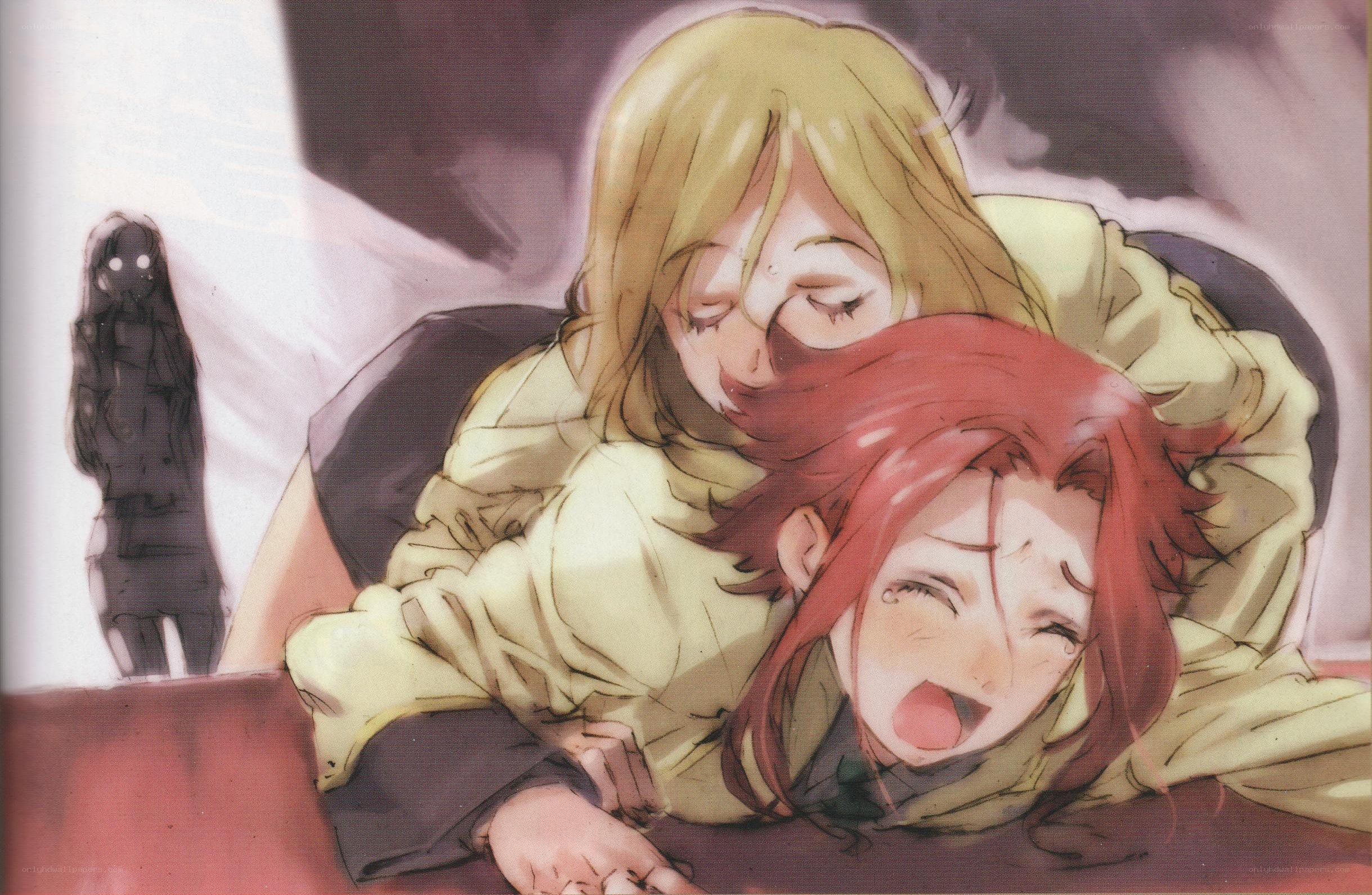 Two girls in a tense embrace