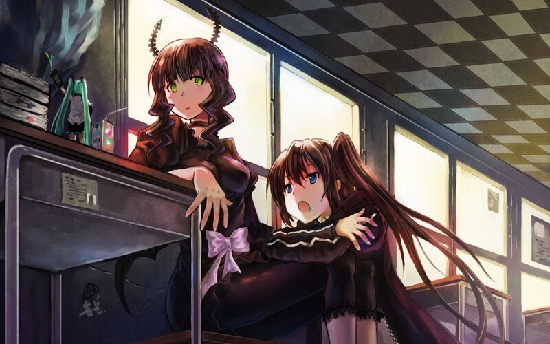 Two girls in a train car