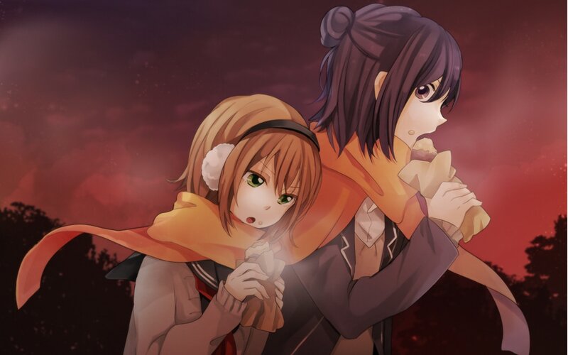 two girls in a warm embrace