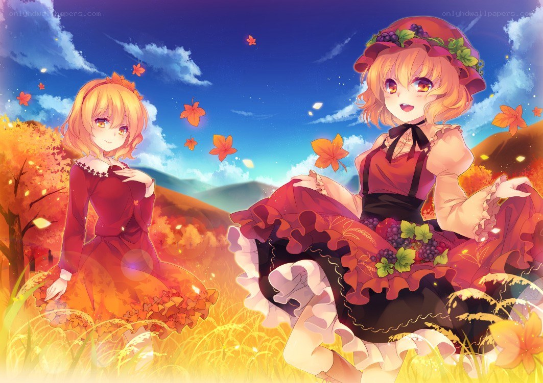 Two girls in autumn field