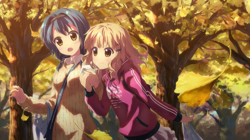 Two girls in autumn forest