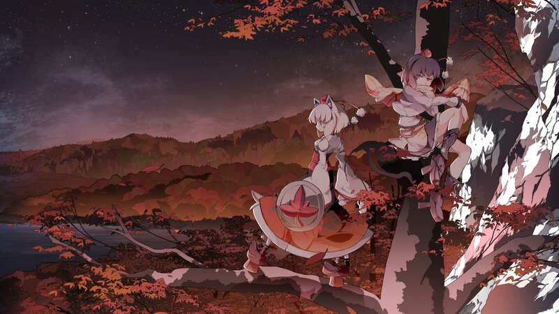 Two girls in autumn forest