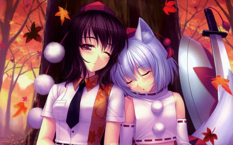 Two girls in autumn forest