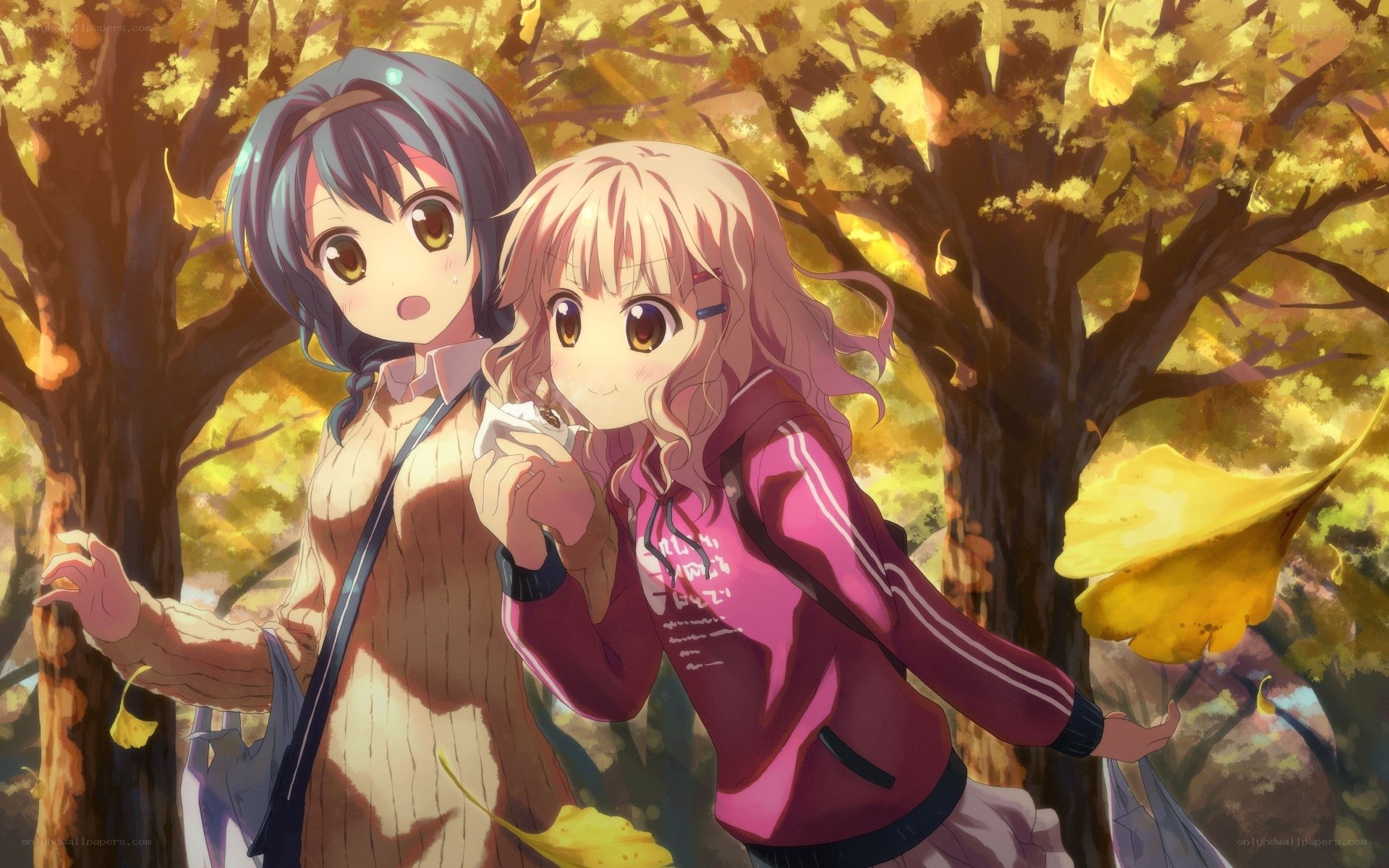 Two girls in autumn forest