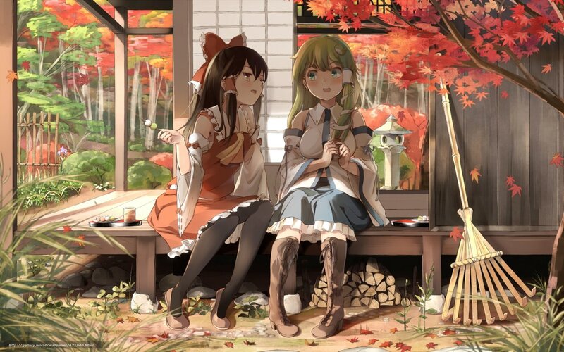 Two girls in autumn garden