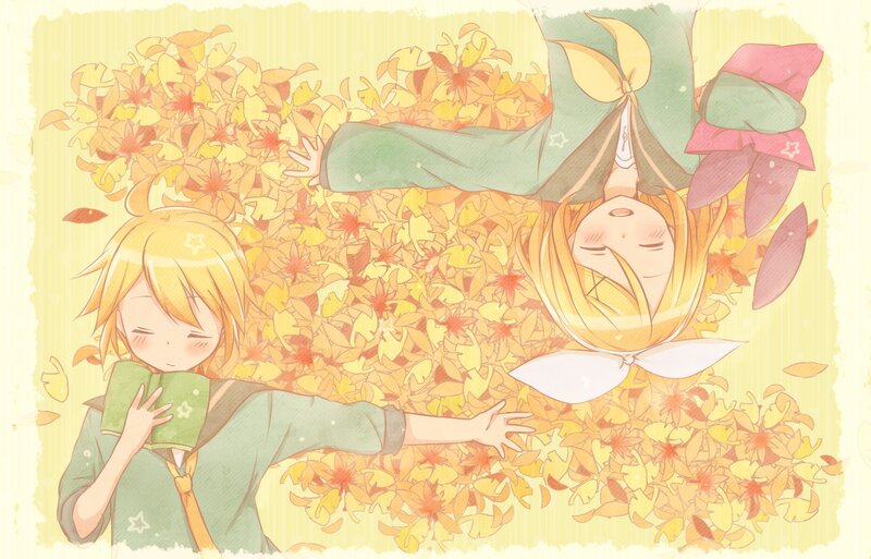 Two girls in autumn leaves