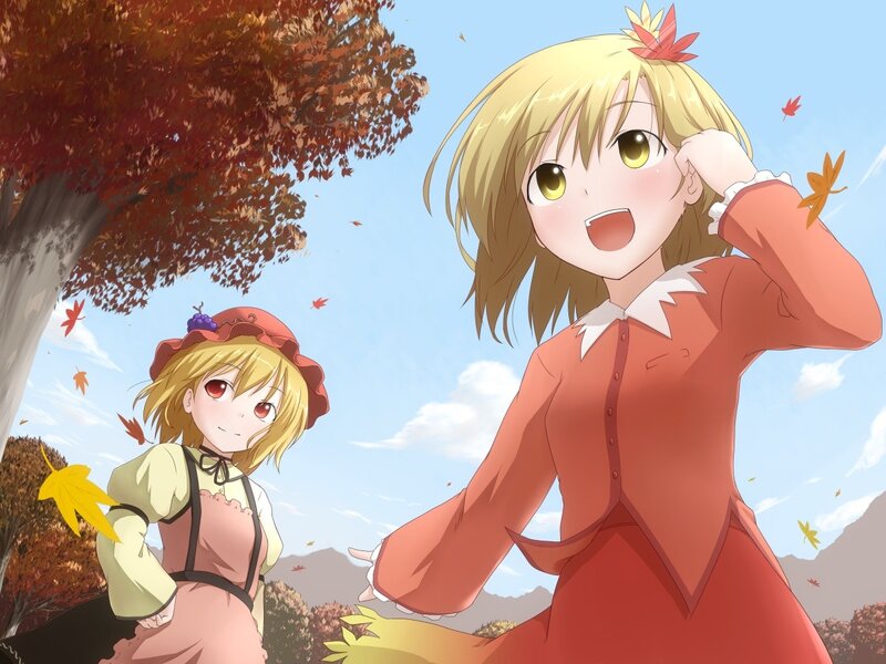 Two girls in autumn scenery