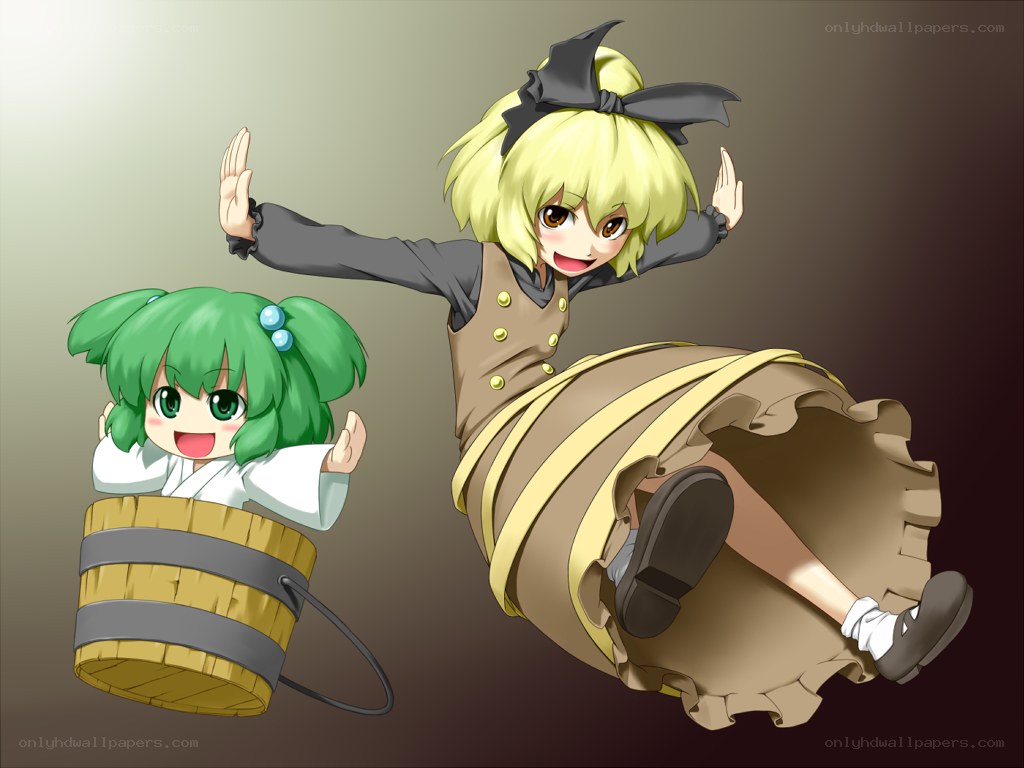 Two girls in barrels
