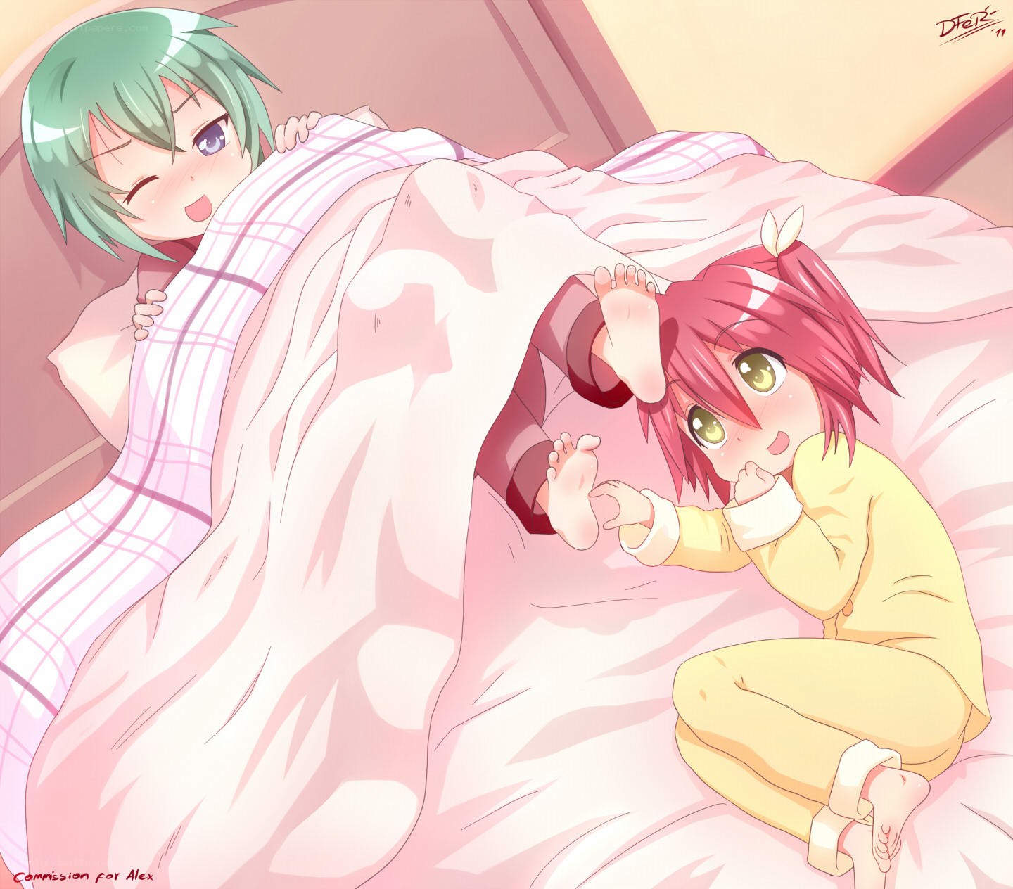 Two girls in bed together