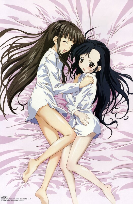 Two girls in bed together