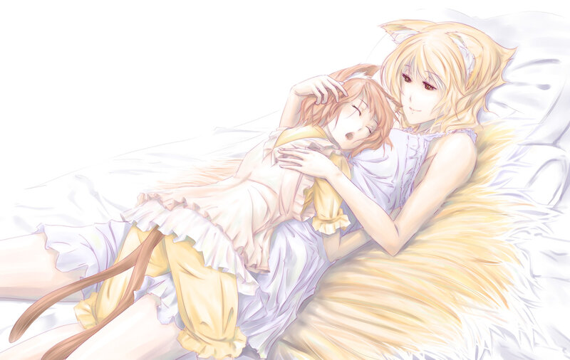 Two girls in bed together