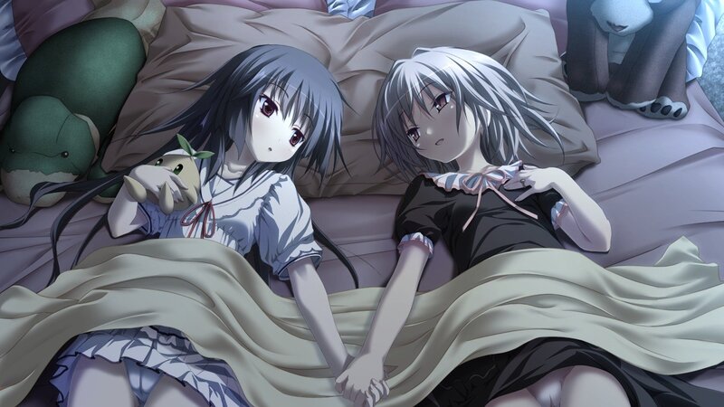 Two girls in bed together
