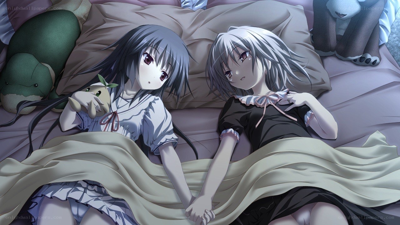 Two girls in bed together