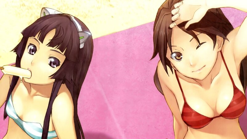 Two girls in bikinis at the beach