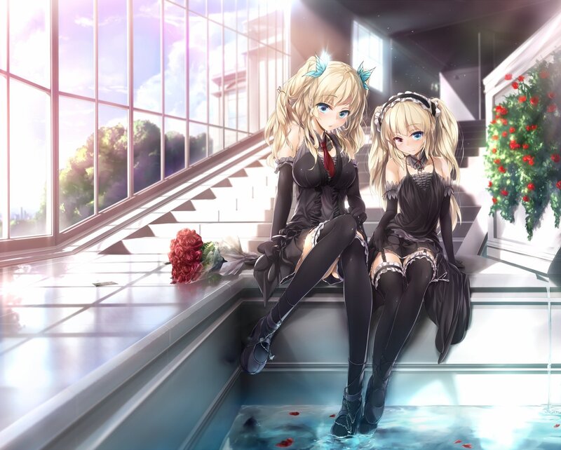 Two girls in black dresses on stairs
