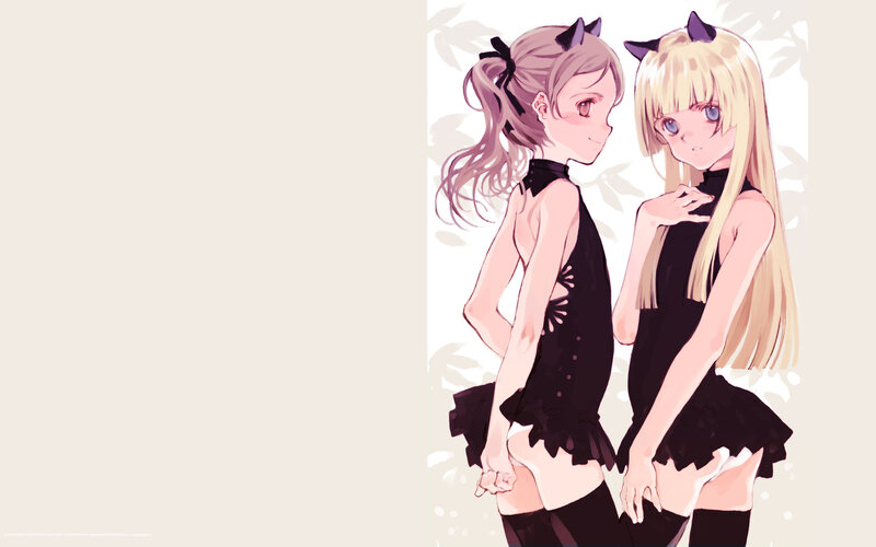 two girls in black dresses