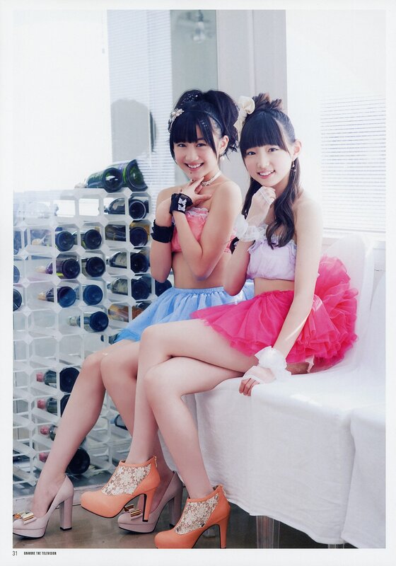 Two girls in colorful outfits
