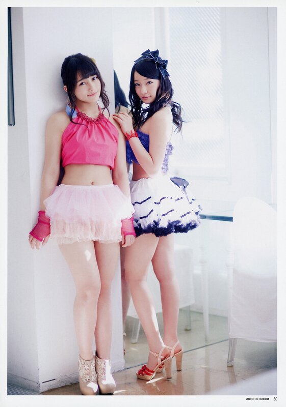 Two girls in colorful outfits