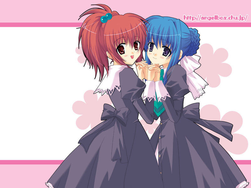 two girls in dark dresses