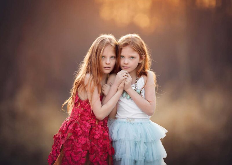 Two Girls in Dresses — Red, Serene, Sunset