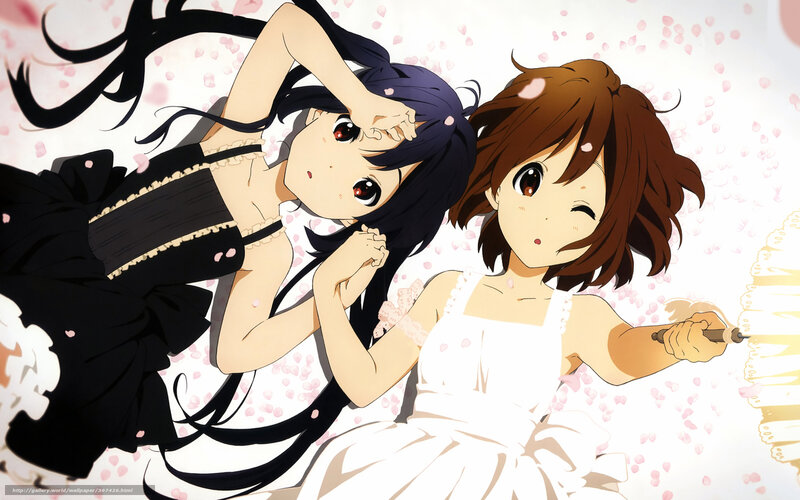 Two girls in dresses with cherry blossoms