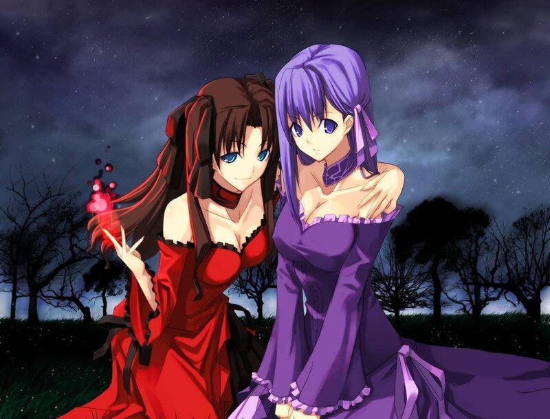 Two girls in elegant dresses at night