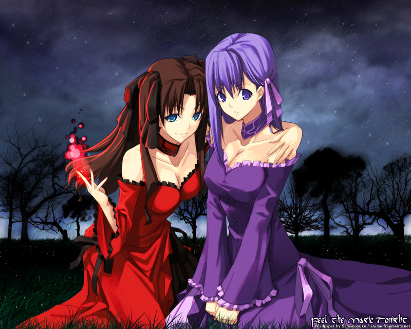 Two girls in elegant dresses at night