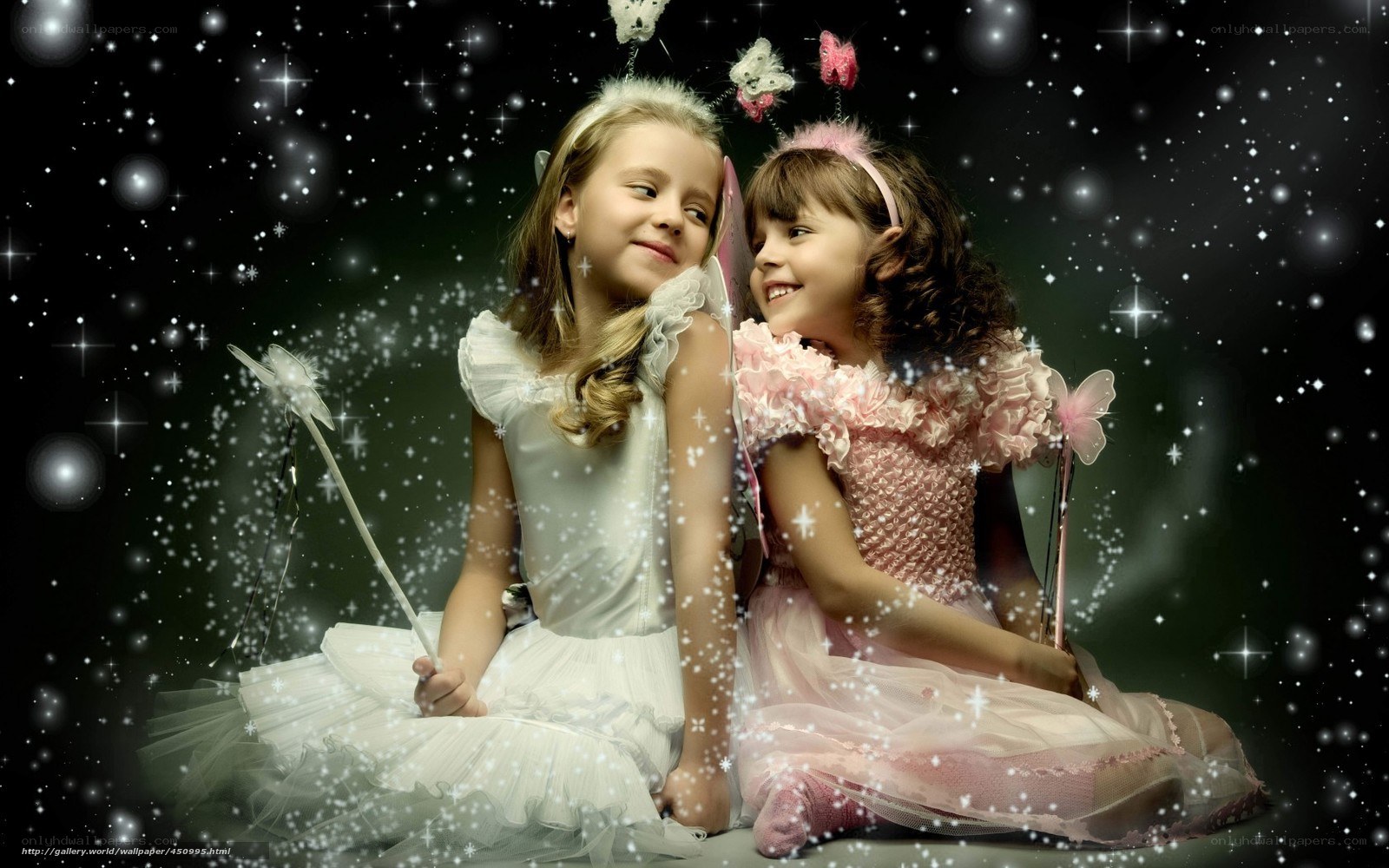 two girls in fairy costumes