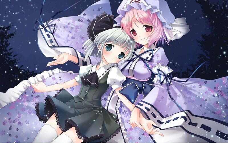 two girls in floral dresses