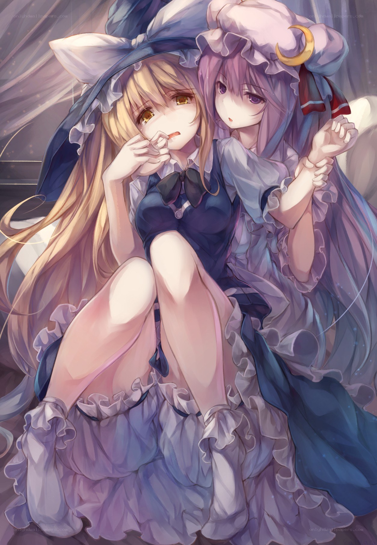 Two girls in frilly dresses