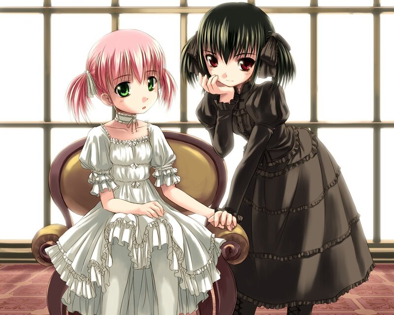 Two girls in frilly dresses