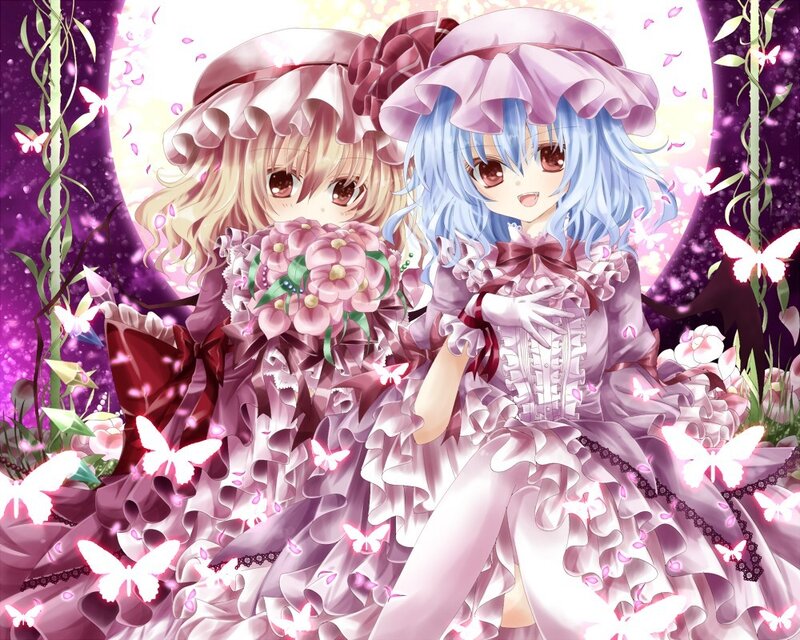 Two girls in frilly dresses with butterflies