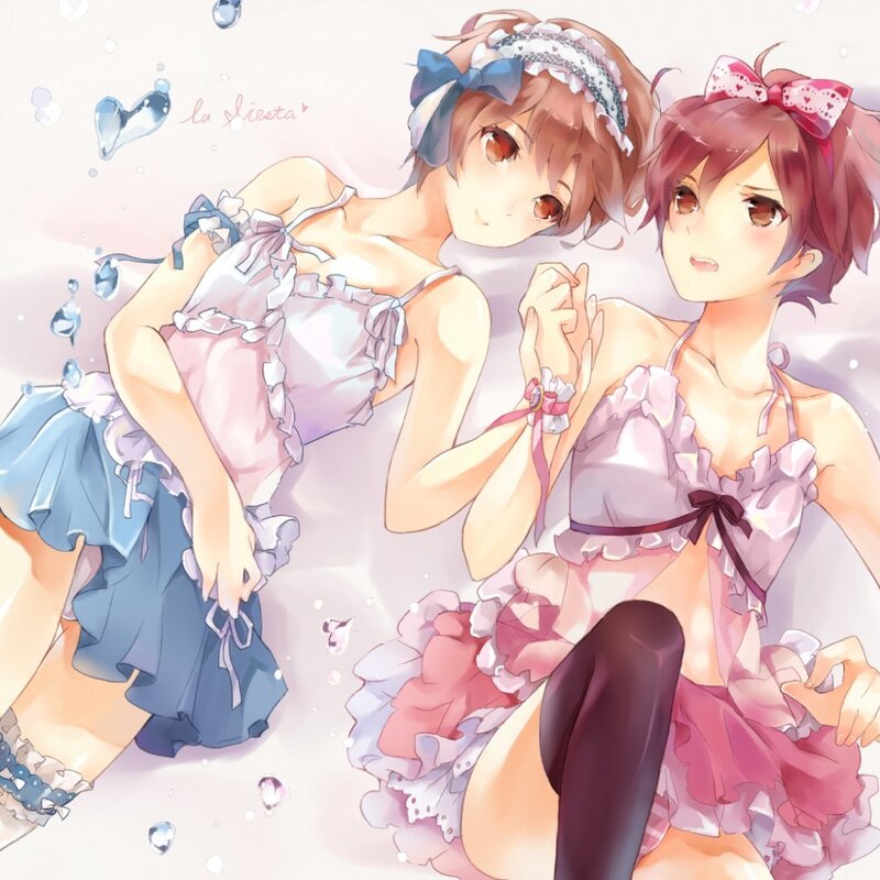 Two Girls in Frilly Outfits