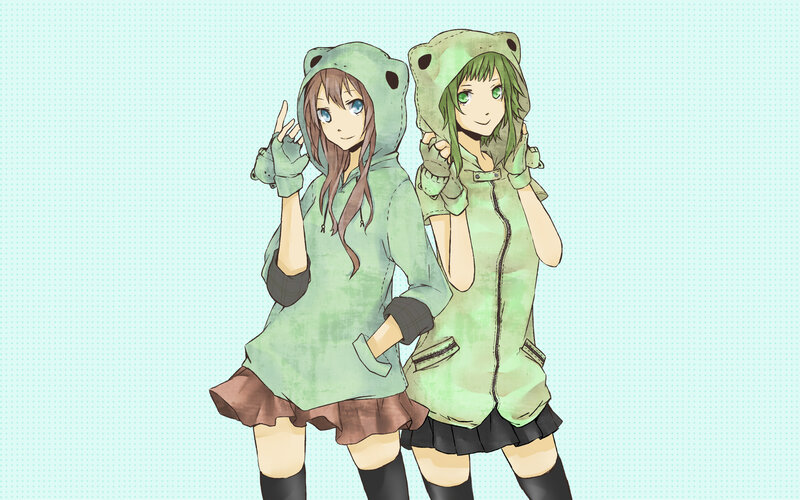 two girls in frog hoodies