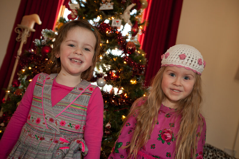 Two Girls in Front of Tree