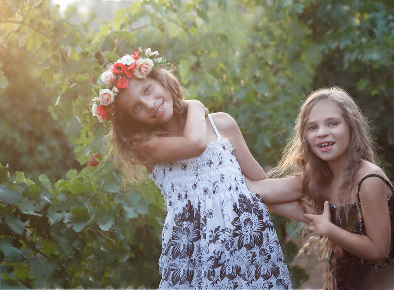 Two Girls in Garden — Green, Playful