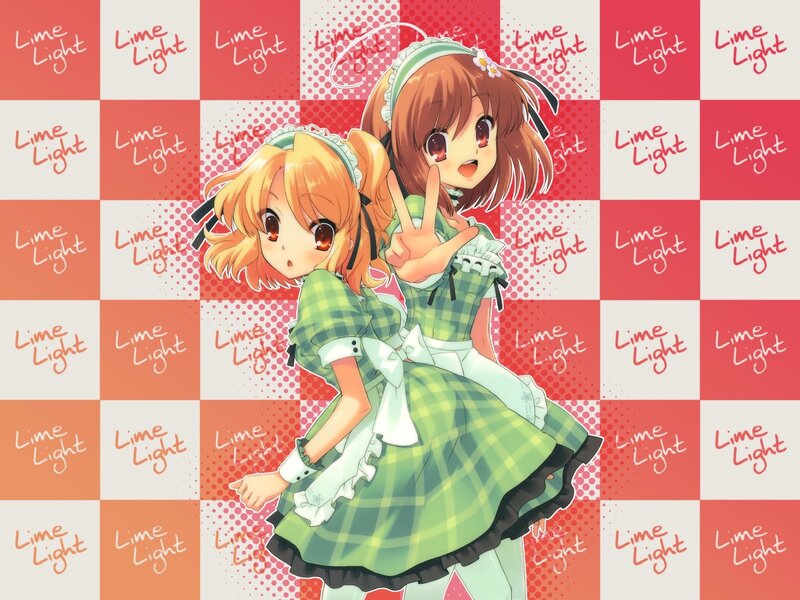 Two girls in green dresses