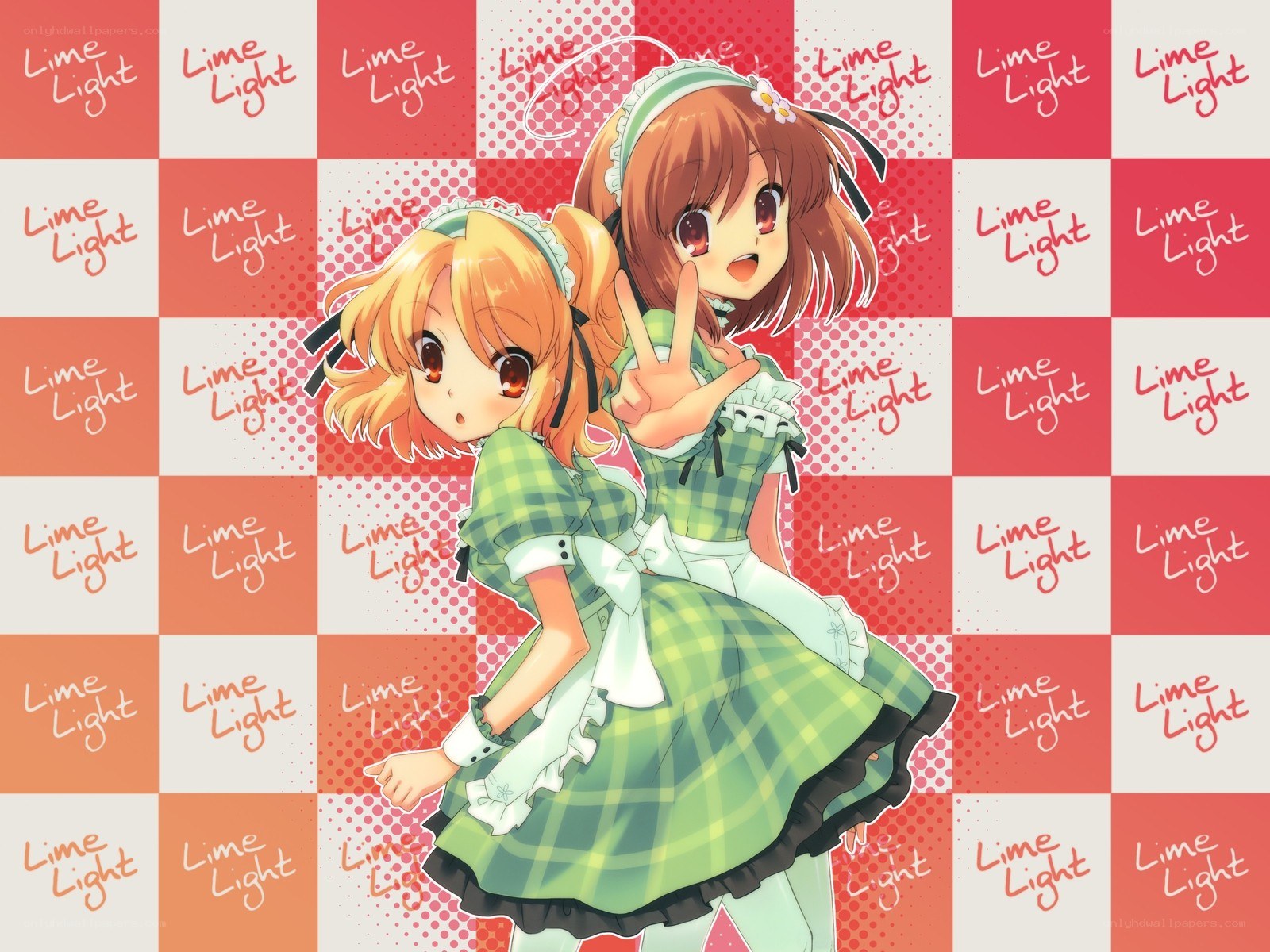 Two girls in green dresses