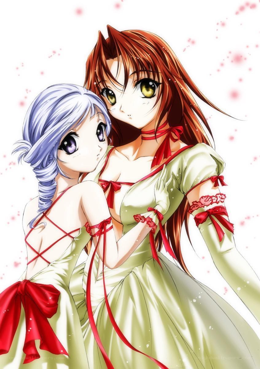 Two girls in green dresses