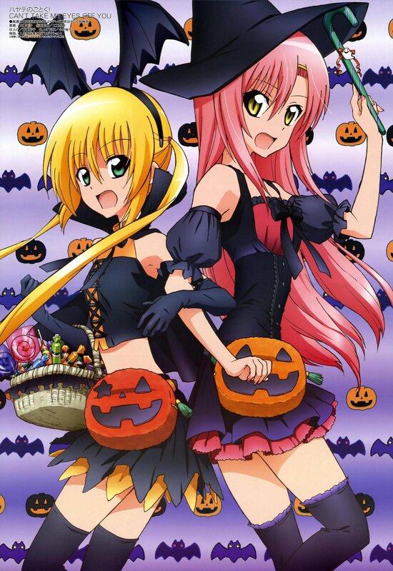 Two girls in Halloween costumes