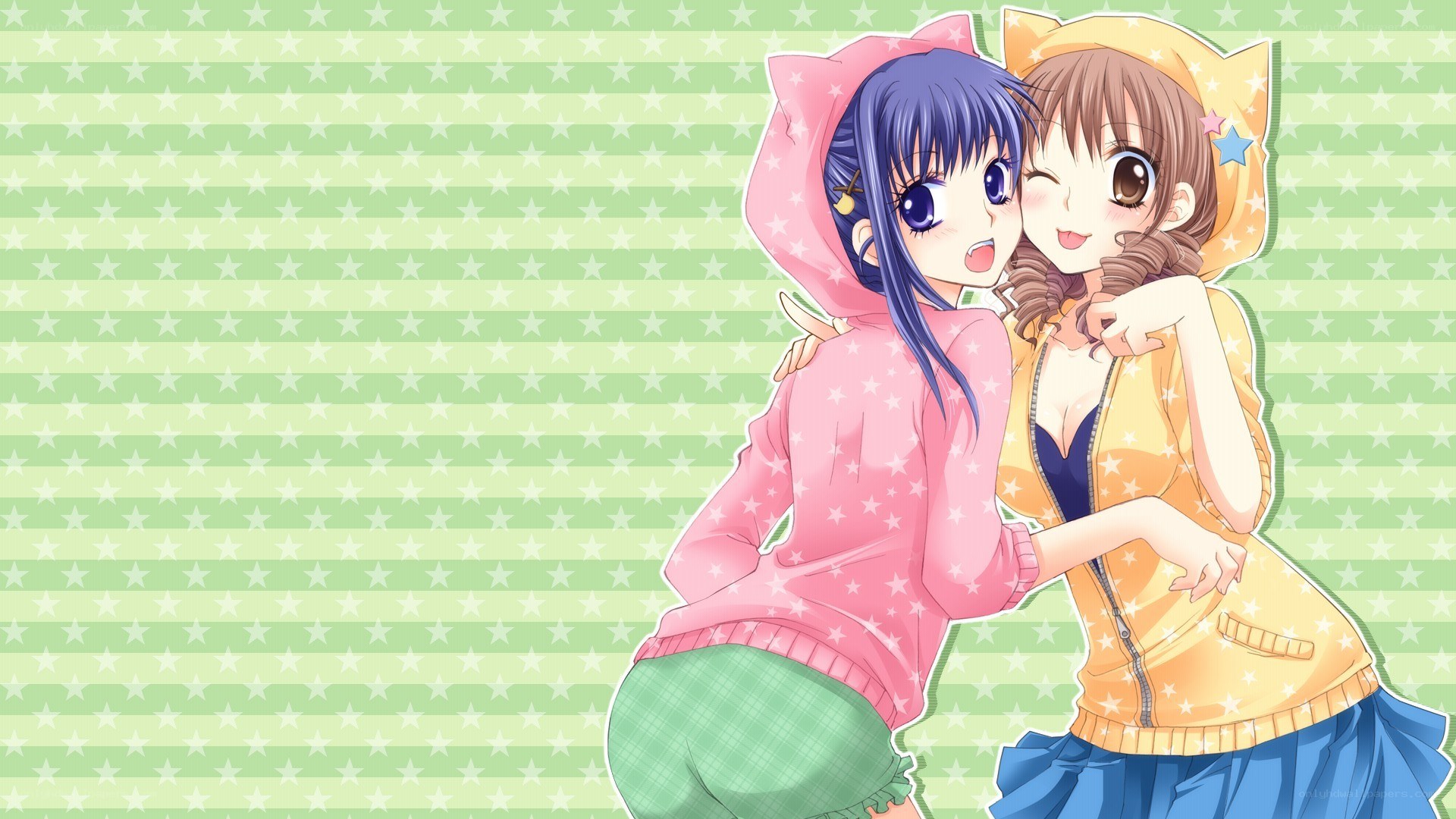 two girls in hoodies hugging
