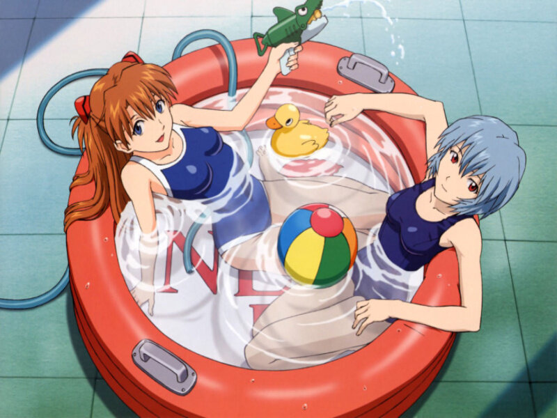 Two Girls in Inflatable Pool