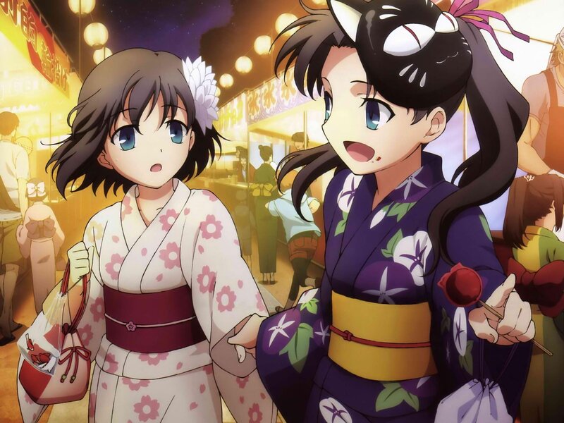 Two girls in kimonos at a festival