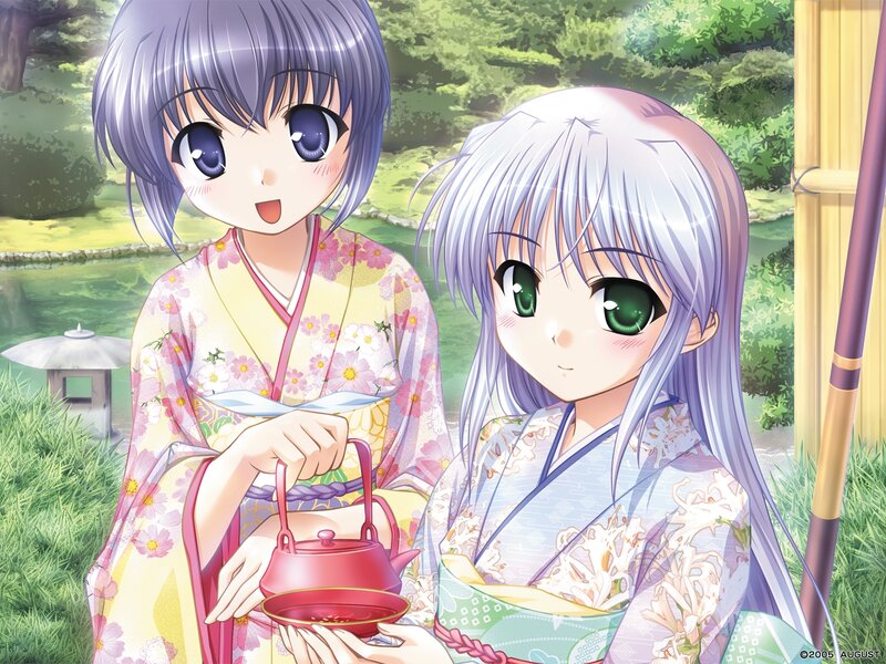 Two girls in kimonos at a tea ceremony